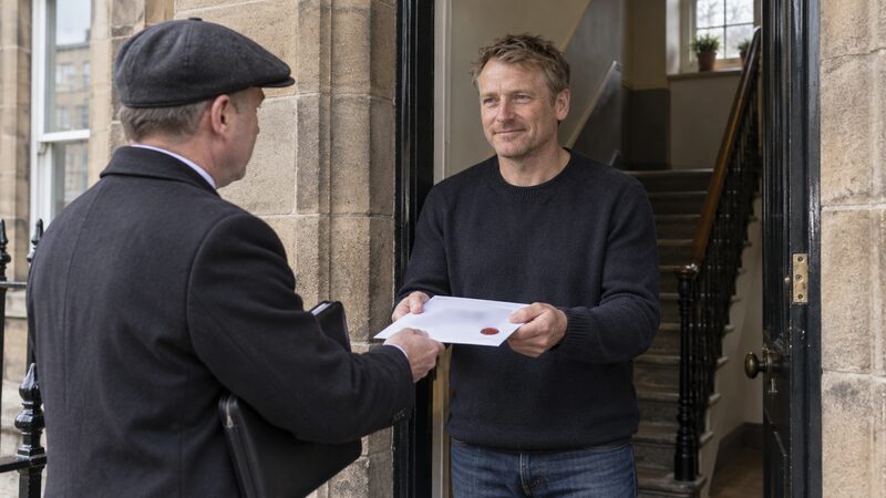 A sheriff officer delivering a document at a front door
